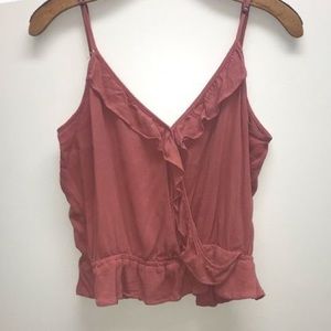 pink ruffled tank top